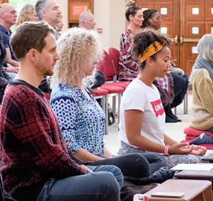 Group of young people meditating image